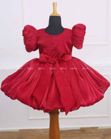 Wine Red Balloon Gown with Handcrafted Rose Embellishment.