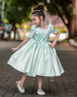 Pastel Aqua Blue Elegant Dress Highlighted With Handcrafted Flowers.