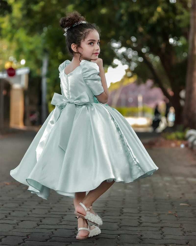 Pastel Aqua Blue Elegant Dress Highlighted With Handcrafted Flowers.   www.liandli.in