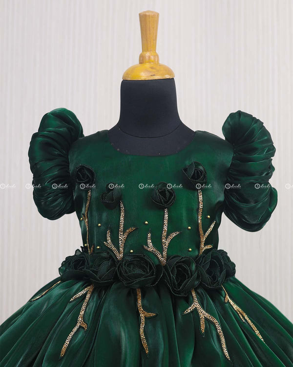 Dark Green Balloon Gown with Handcrafted Rose Embellishment.