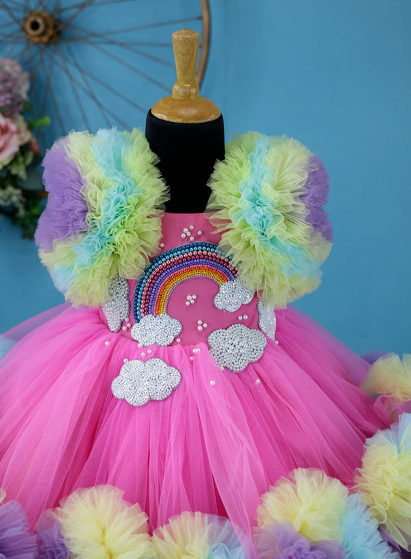 Rainbow with cloud theme in light multi colour frilled gown