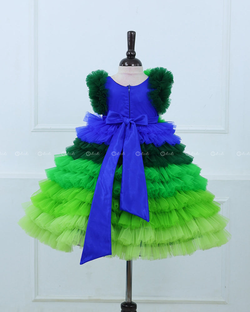 Peacock Shaded Fluffy Layered Gown with Curve Line Bead Work