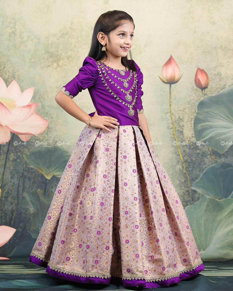 Purple Crop Top With Handworked Layer Necklace And Brocade Skirt