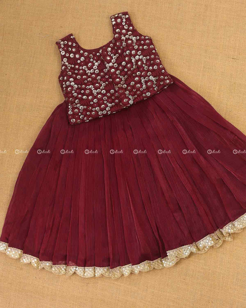 Burgundy Color Skirt with Embroidery Material Top.