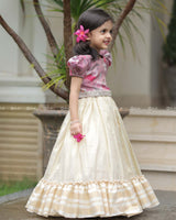 Mauve Floral Puff-Sleeve Top With Lace Hem, Paired With Cream Flared Skirt Featuring Golden Stripes And Ruffle Border