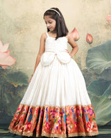 Ivory Frock With Pearl Neckline, Ruched Yoke, Waist Bow And Floral Woven Border