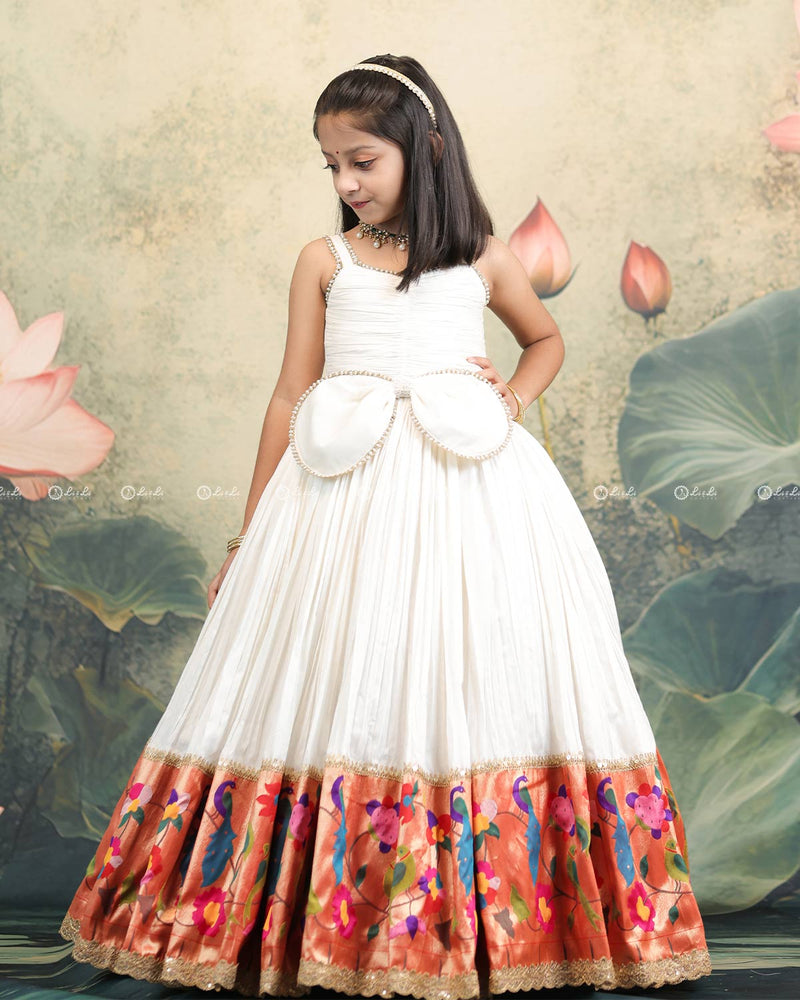 Ivory Frock With Pearl Neckline, Ruched Yoke, Waist Bow And Floral Woven Border