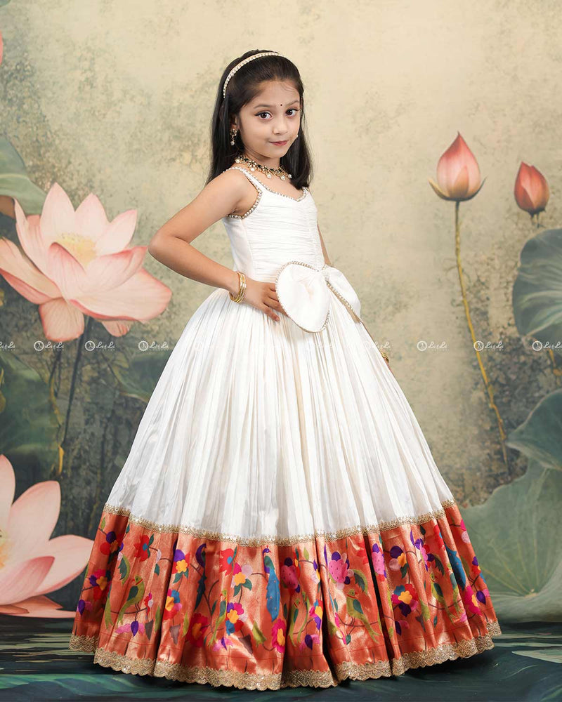 Ivory Frock With Pearl Neckline, Ruched Yoke, Waist Bow And Floral Woven Border