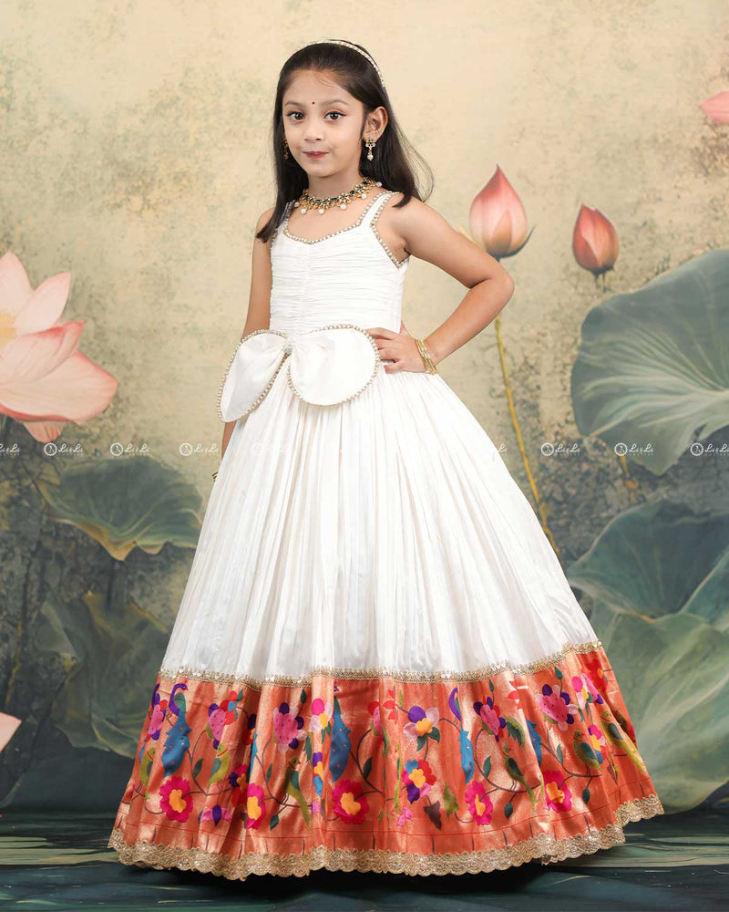 Ivory Frock With Pearl Neckline, Ruched Yoke, Waist Bow And Floral Woven Border
