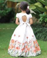White Scallop Top With Pearl Beads, Paired With A Floral Poppy Print Skirt