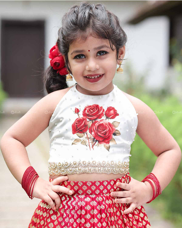 Floral Halter Top With Pearl Detailing, Paired With Red Brocade Skirt