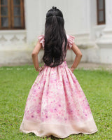 Pink Lace Top With Flutter Sleeves Paired With A Floral Umbrella Skirt