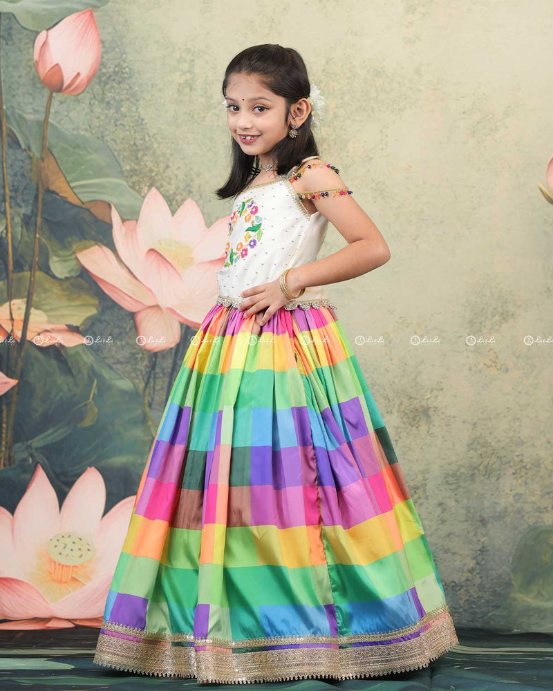 Pearl White Top With Colorful Beaded Tassel Sleeves And Multi-Color Checked Skirt