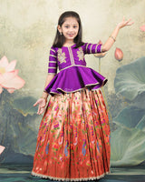 Purple Peplum Top Paired With A Printed Skirt