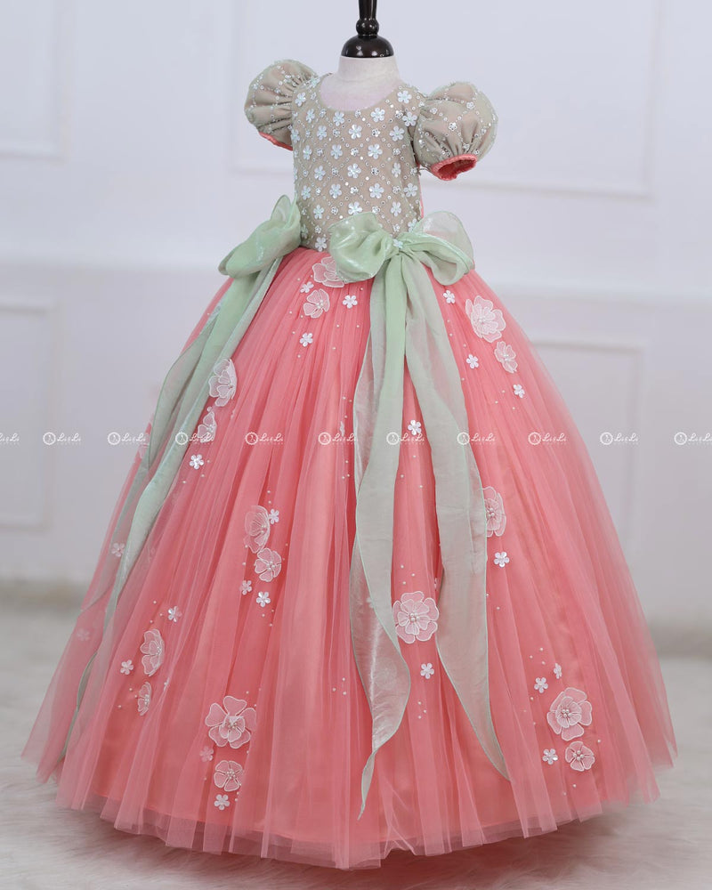 Peach Color Gown with White Flower Applique Detailing & Light Green Long Bow
