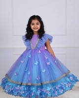 Lavender and light Blue Flower Gown  Butterfly and pearl Embellishment.