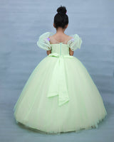 Pastel Green Gown with Ruffled Sleeves