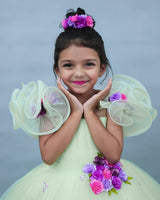 Pastel Green Gown with Ruffled Sleeves