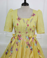 Butterfly and Floral Theme Yellow Gown with Attached Bows and Applique Works