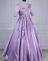 Butterfly and Floral Theme Lavender Gown with Attached Bows and Applique Works.