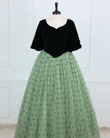 Dark Forest Green velvet sweetheart gown with flowy sleeves and a mint heart-mesh flare.