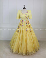 Butterfly and Floral Theme Yellow Gown with Attached Bows and Applique Works