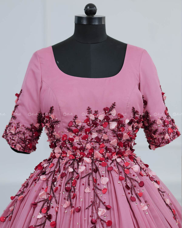 Dusty Rose  Elegant Gown Highlighted With Handcrafted Flowers.