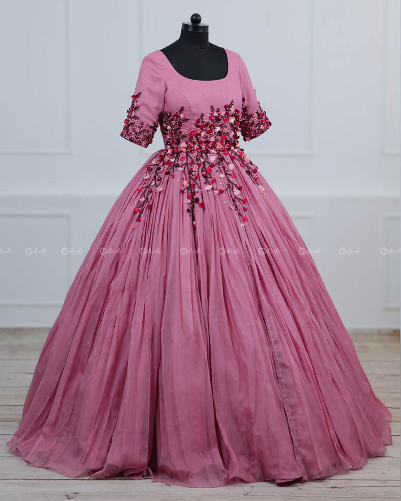 Dusty Rose  Elegant Gown Highlighted With Handcrafted Flowers.