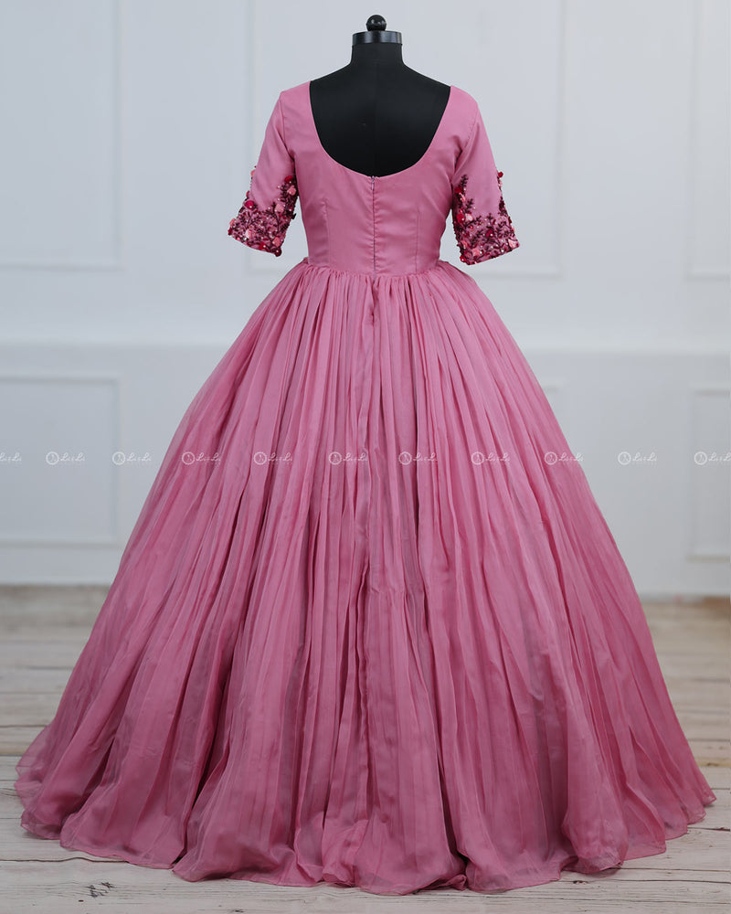 Dusty Rose  Elegant Gown Highlighted With Handcrafted Flowers.