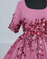 Dusty Rose  Elegant Gown Highlighted With Handcrafted Flowers.