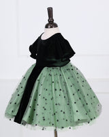 Dark Forest Green velvet frock with flutter sleeves and a mint heart-mesh skirt.