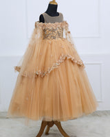 Peach-gold gown with 3D florals and soft tulle flare