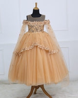 Peach-gold gown with 3D florals and soft tulle flare