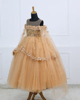 Peach-gold gown with 3D florals and soft tulle flare