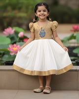 Elegant ethnic wear adorned with exquisite peacock handwork.