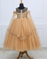 Peach-gold gown with 3D florals and soft tulle flare