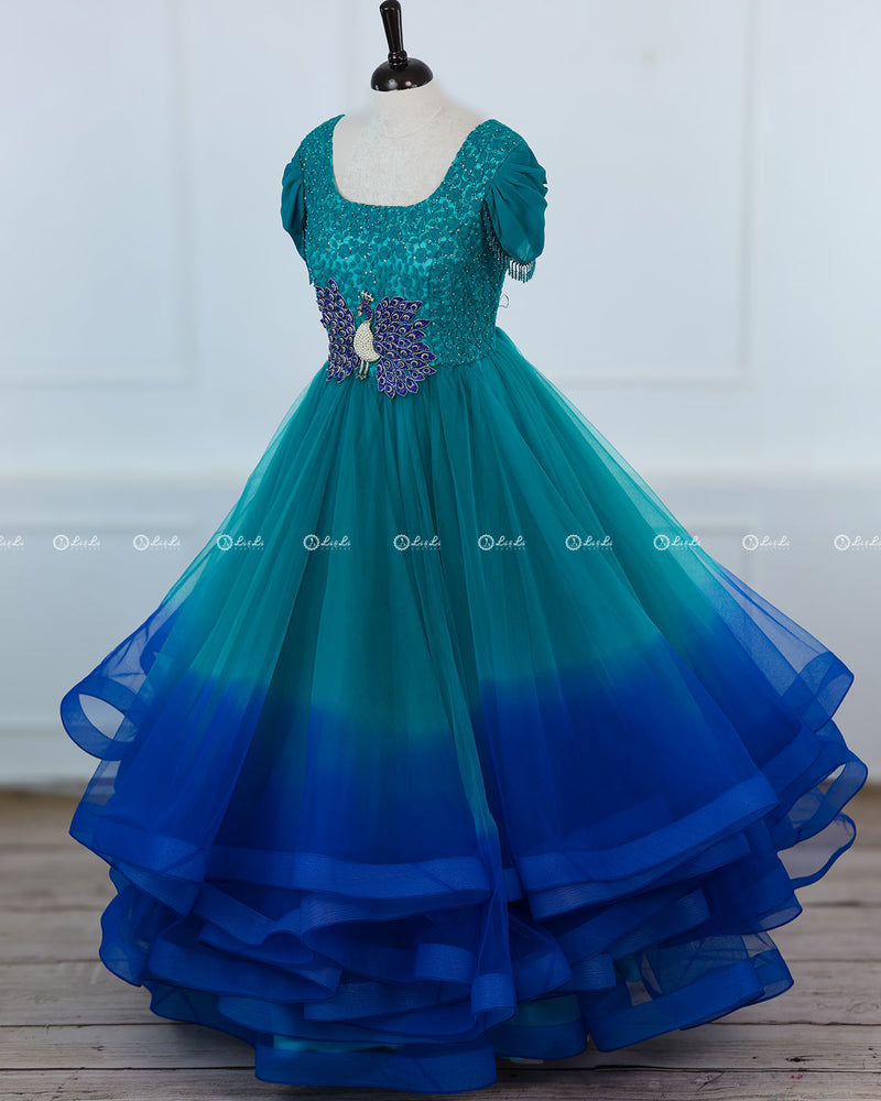 Peacock Green and Peacock Blue Gradient Gown with Cowl Sleeve and Peacock Handwork on Yoke.