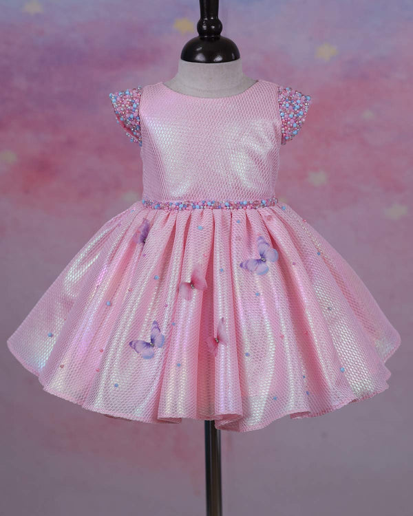 Elegant Baby Pink Frock Highlighted with beads and stones with Handcrafted Multicolour butterflies.
