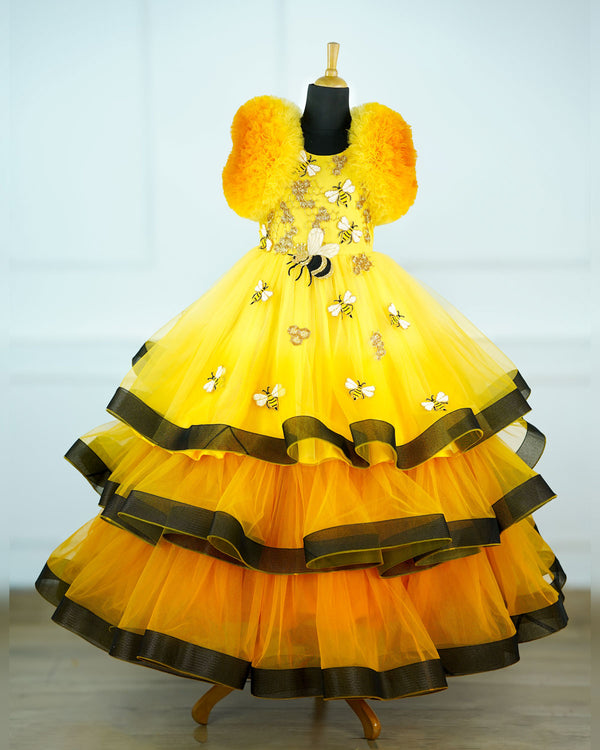Yellow Color Gradient Netted Ball Frill Sleeve Full gown with handcrafted honeybee theme bead embellishments and a black ruffled border