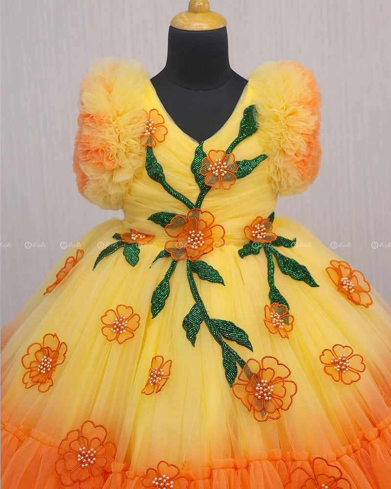 Beautiful Orange and Yellow Double Shaded Gown with Handicrafted Flowers and Leaves