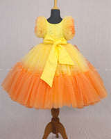 Beautiful Orange and Yellow Double Shaded Gown with Handicrafted Flowers and Leaves