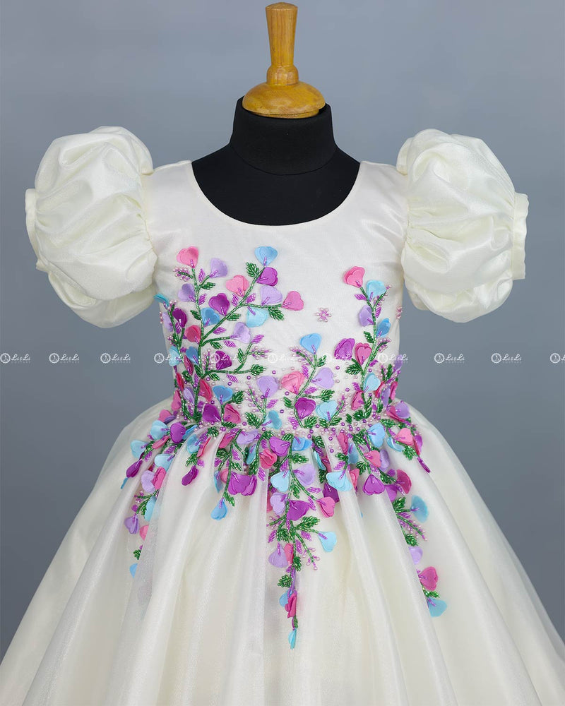 Elegant White Gown Highlighted with Handcrafted Multicolour Flowers