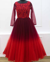 Red and maroon ombre shaded designer gown with applique flowers and bead work