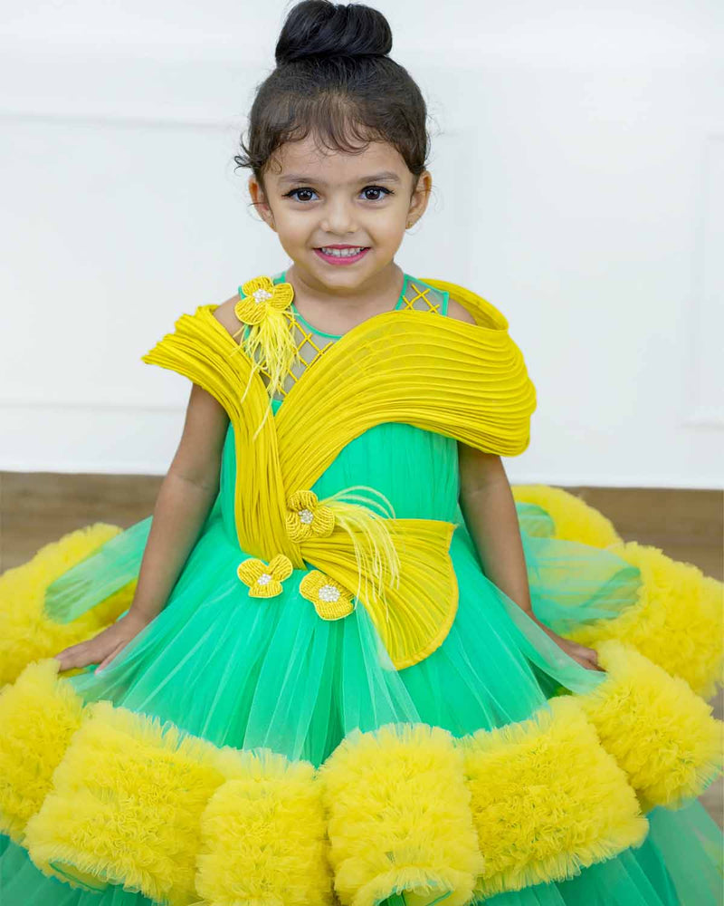 Aqua green and light mango yellow layered frilled gown with stylish pintuck fabric manipulation