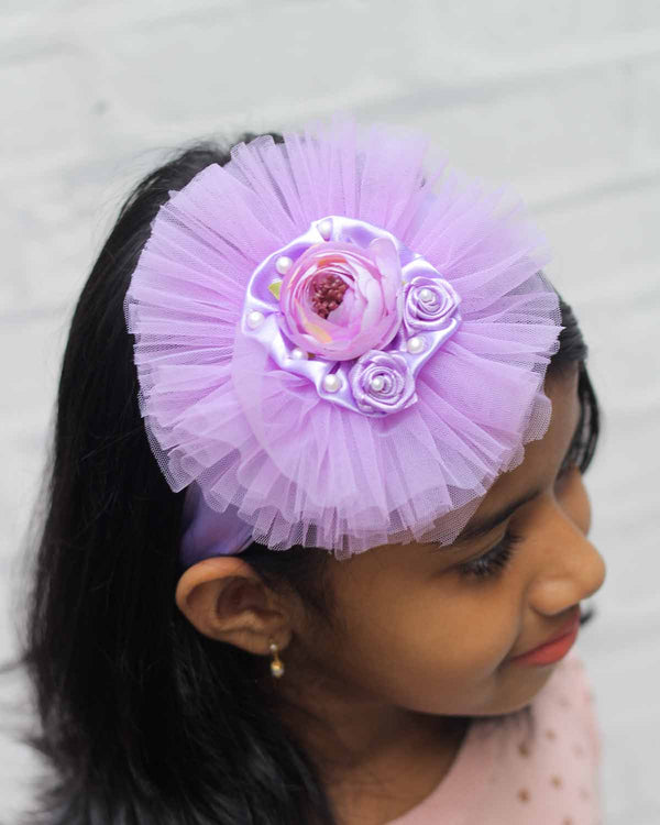 Lavender Fascinator head band with artificial flower